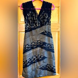 Women’s Sleeveless black lace dress with beige underlay (Size 8)
